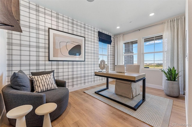 office space with light wood-type flooring