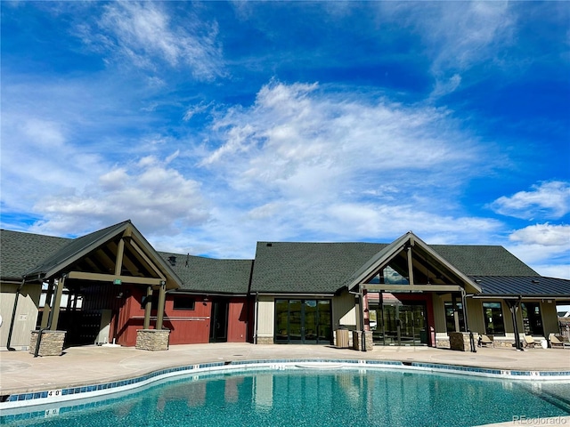 view of pool featuring a patio