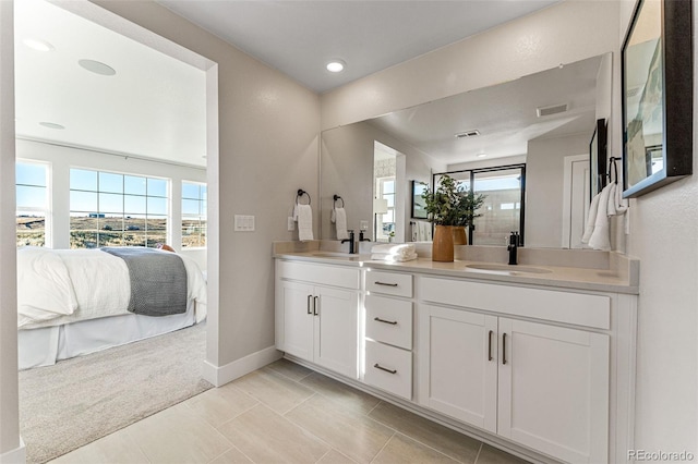 bathroom featuring vanity and tile patterned flooring