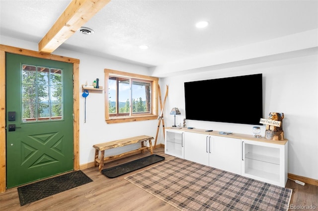 489 Harris Dr, Idaho Springs, CO 80452 - entrance foyer featuring baseboards, light wood-type flooring, beam ceiling, and recessed lighting