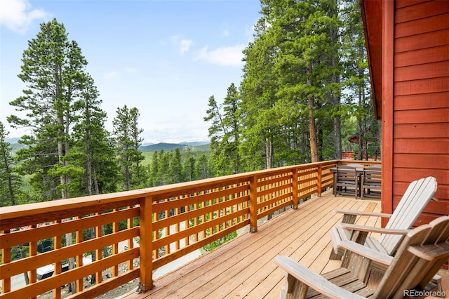 489 Harris Dr, Idaho Springs, CO 80452 - wooden deck with a mountain view