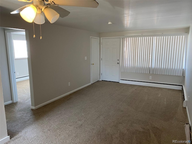 unfurnished room with ceiling fan, carpet floors, and baseboard heating