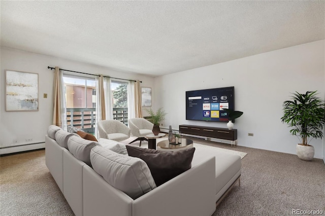 carpeted living room with a baseboard heating unit and a textured ceiling