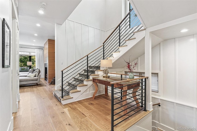 stairway featuring hardwood / wood-style floors