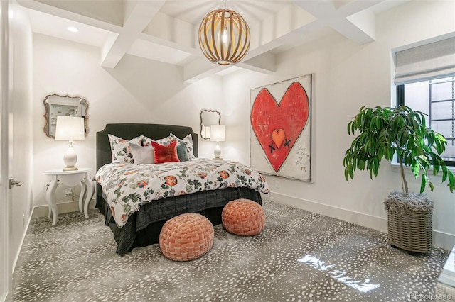 bedroom with beam ceiling and coffered ceiling