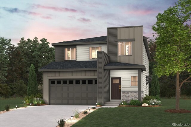 contemporary house with board and batten siding, driveway, an attached garage, and a front lawn