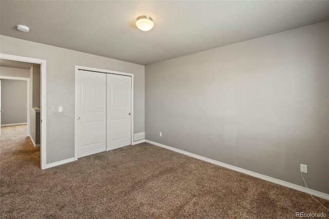 6154 Fiddle Way, Colorado Springs, CO 80925 - unfurnished bedroom with carpet flooring and a closet
