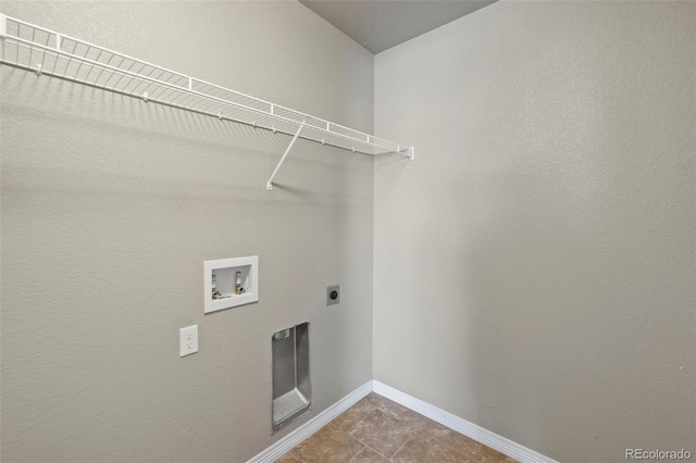 6154 Fiddle Way, Colorado Springs, CO 80925 - washroom with hookup for an electric dryer, washer hookup, and tile patterned floors