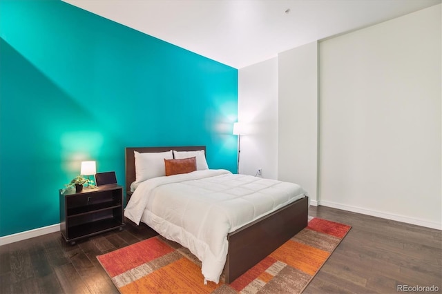2958 Syracuse St Unit 317, Denver, CO 80238 - bedroom with wood finished floors and baseboards