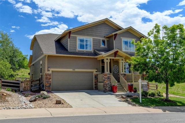 2815 Dreamcatcher Loop, Castle Rock, CO 80109 - craftsman house with an attached garage, driveway, and stone siding
