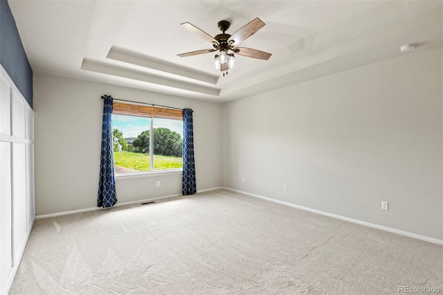2815 Dreamcatcher Loop, Castle Rock, CO 80109 - carpeted empty room featuring ceiling fan, a tray ceiling, and a smoke detector