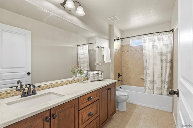 2815 Dreamcatcher Loop, Castle Rock, CO 80109 - bathroom featuring vanity, shower / bathtub combination with curtain, tile patterned floors, and a textured ceiling