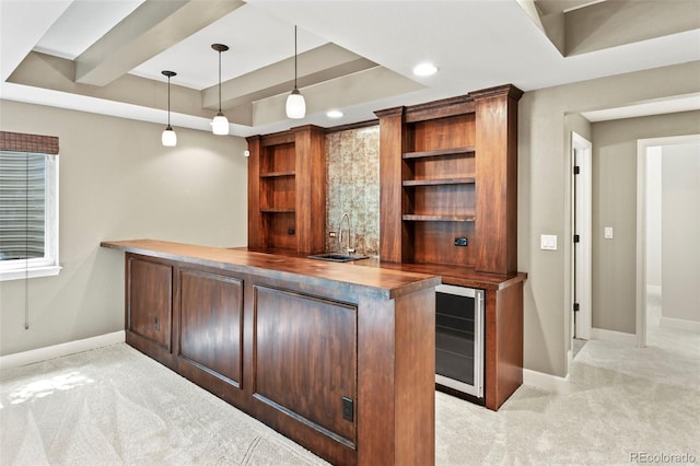 2815 Dreamcatcher Loop, Castle Rock, CO 80109 - bar area featuring beverage cooler, light colored carpet, hanging light fixtures, and a tray ceiling