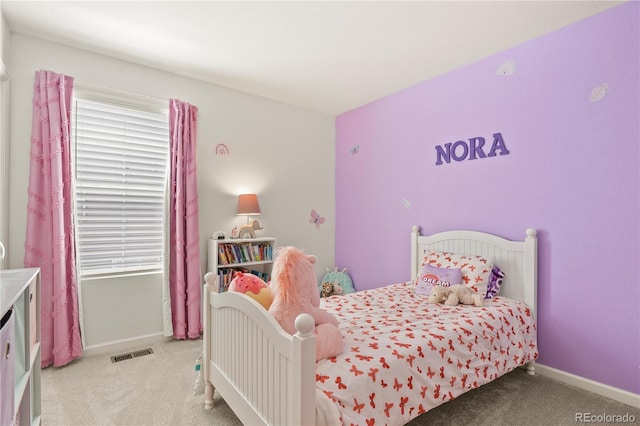 23920 E 34th Ave, Aurora, CO 80019 - bedroom featuring light carpet and baseboards