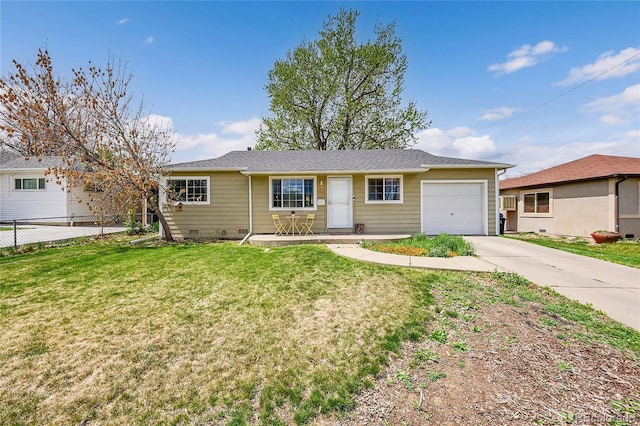 ranch-style home with a garage, a front lawn, fence, and driveway