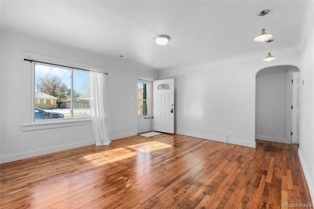 spare room with hardwood / wood-style flooring