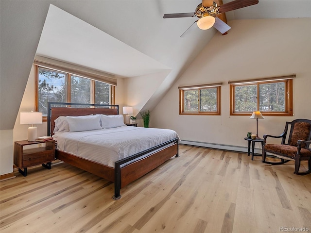 bedroom featuring ceiling fan, lofted ceiling, baseboard heating, and light wood-style flooring