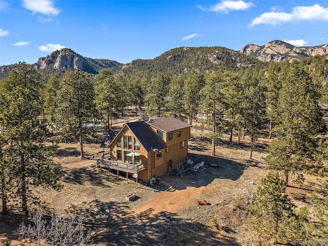 exterior space with a forest view