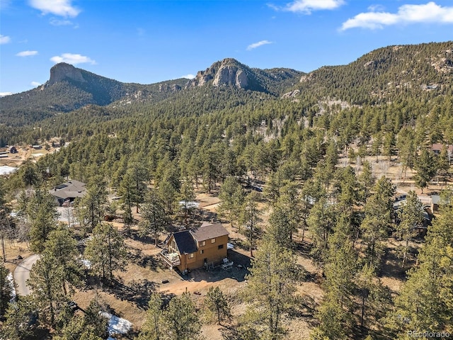 property view of mountains featuring a wooded view