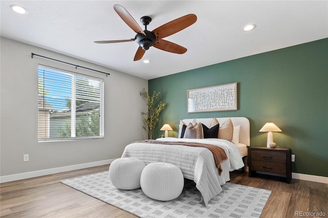 11845 W Tulane Dr, Morrison, CO 80465 - bedroom featuring recessed lighting, wood finished floors, and ceiling fan