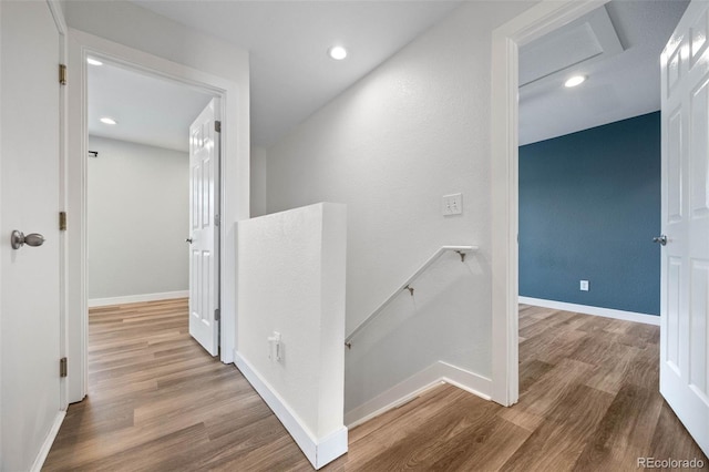 11845 W Tulane Dr, Morrison, CO 80465 - corridor featuring an upstairs landing, wood finished floors, attic access, and recessed lighting
