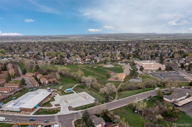 birds eye view of property with a residential view