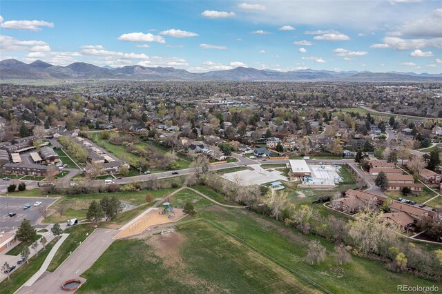 aerial view with a mountain view and a residential view