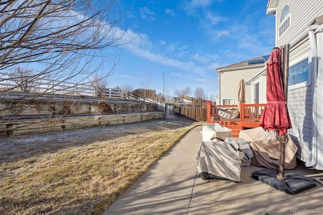 view of yard with a deck