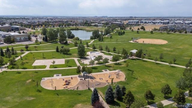 birds eye view of property with a water view