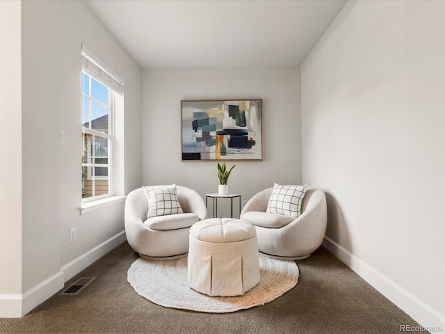 2880 Emporia Ct, Denver, CO 80238 - living area featuring carpet floors and baseboards