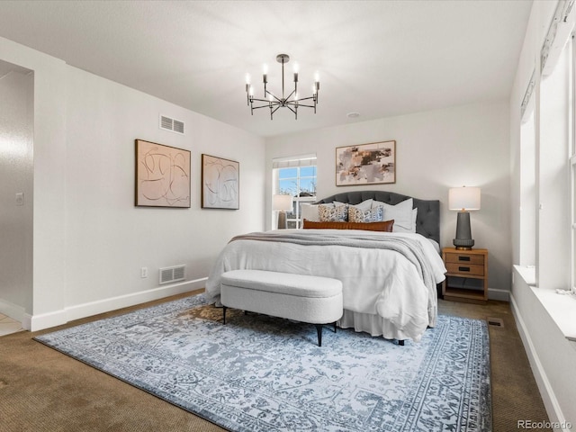 2880 Emporia Ct, Denver, CO 80238 - bedroom with carpet, a chandelier, and baseboards