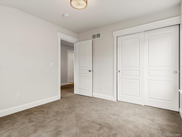 2880 Emporia Ct, Denver, CO 80238 - unfurnished bedroom with carpet, baseboards, and a closet
