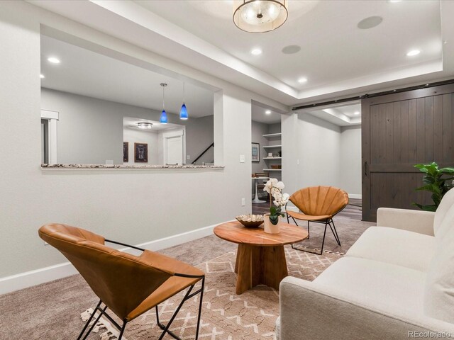 2880 Emporia Ct, Denver, CO 80238 - carpeted living room with baseboards, recessed lighting, stairs, and a tray ceiling