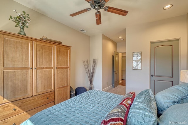 bedroom featuring visible vents, recessed lighting, baseboards, light colored carpet, and ceiling fan