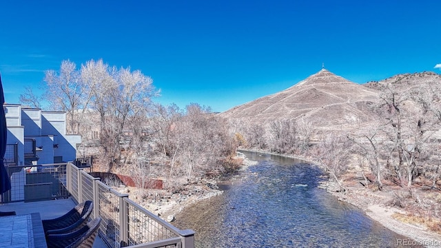 property view of mountains featuring a water view