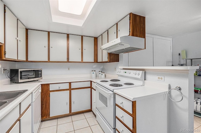17053 E Tennessee Dr Unit 212, Aurora, CO 80017 - kitchen featuring white appliances, under cabinet range hood, light tile patterned flooring, light countertops, and a sink