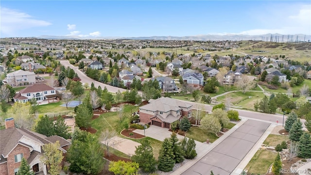 aerial view featuring a residential view and a mountain view