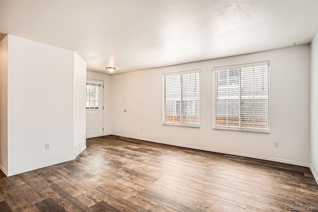 8057 Bryant St, Westminster, CO 80031 - empty room featuring wood finished floors and baseboards