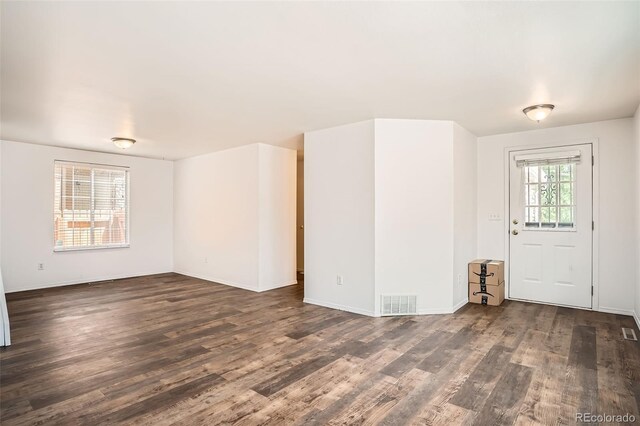 8057 Bryant St, Westminster, CO 80031 - empty room with dark wood-style flooring