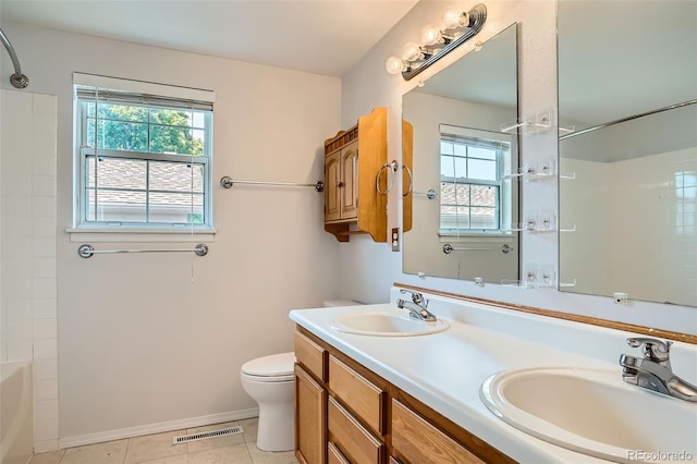 8057 Bryant St, Westminster, CO 80031 - bathroom featuring double vanity, tile patterned floors, and bathtub / shower combination