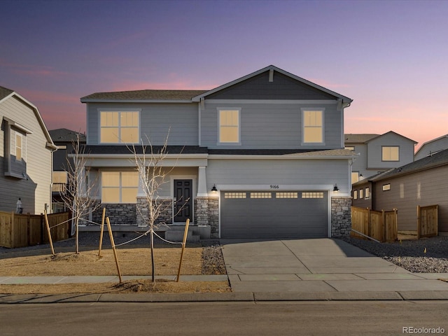 view of front of home with a garage