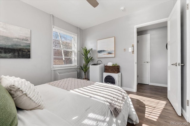 bedroom featuring dark wood-type flooring and ceiling fan