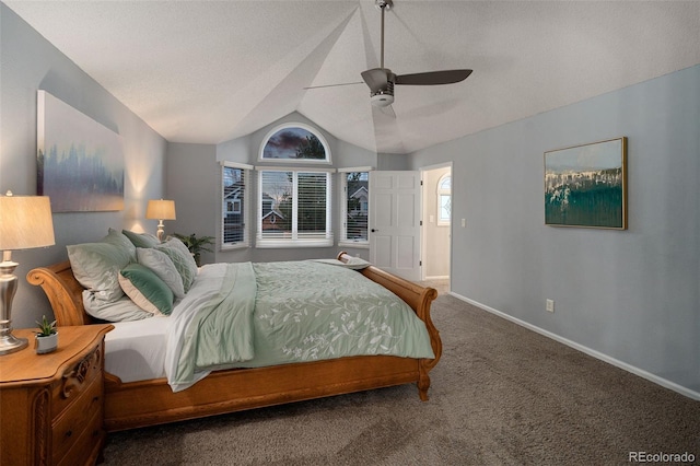 bedroom featuring baseboards, lofted ceiling, carpet, and ceiling fan