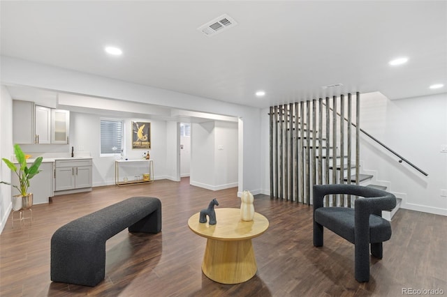 982 S Holly St, Denver, CO 80246 - living area with recessed lighting, stairway, baseboards, and dark wood finished floors