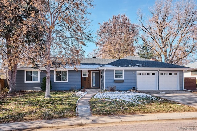 single story home featuring a garage