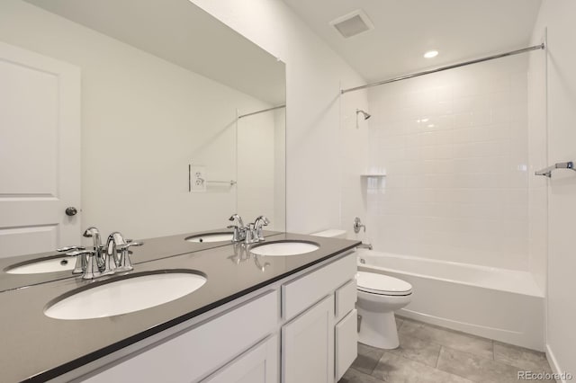 full bath featuring a sink, toilet, and visible vents
