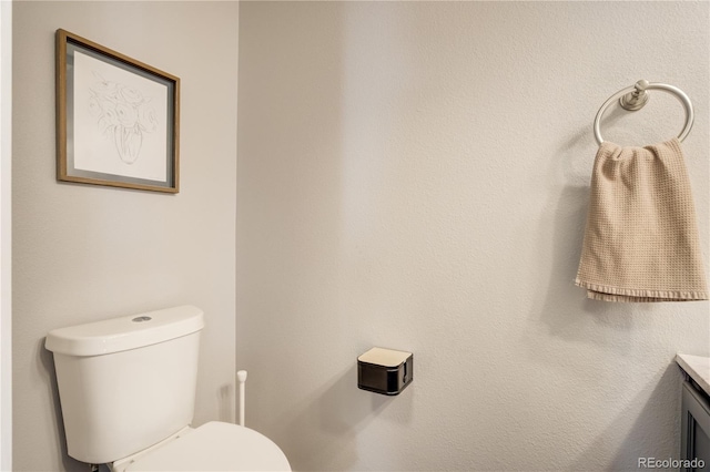 6840 Goldcrest Ct, Colorado Springs, CO 80919 - half bathroom with vanity and toilet
