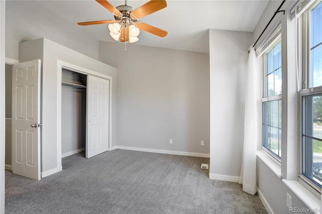 6840 Goldcrest Ct, Colorado Springs, CO 80919 - unfurnished bedroom with multiple windows, carpet floors, a closet, and baseboards