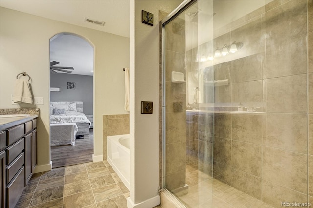6840 Goldcrest Ct, Colorado Springs, CO 80919 - full bath featuring ensuite bathroom, a stall shower, vanity, and a bath
