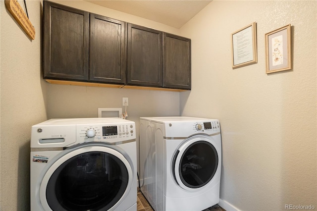 6840 Goldcrest Ct, Colorado Springs, CO 80919 - washroom featuring cabinet space and separate washer and dryer